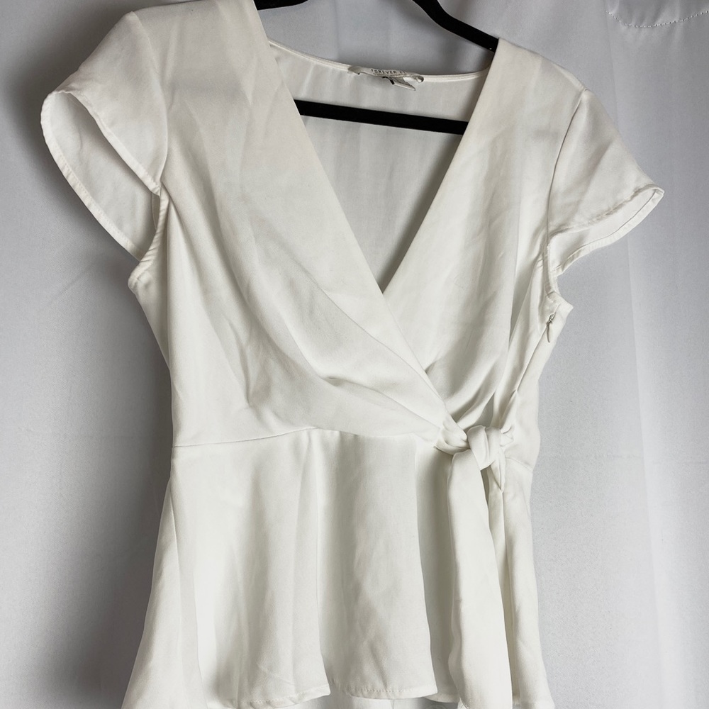 White blouse V neck tie side